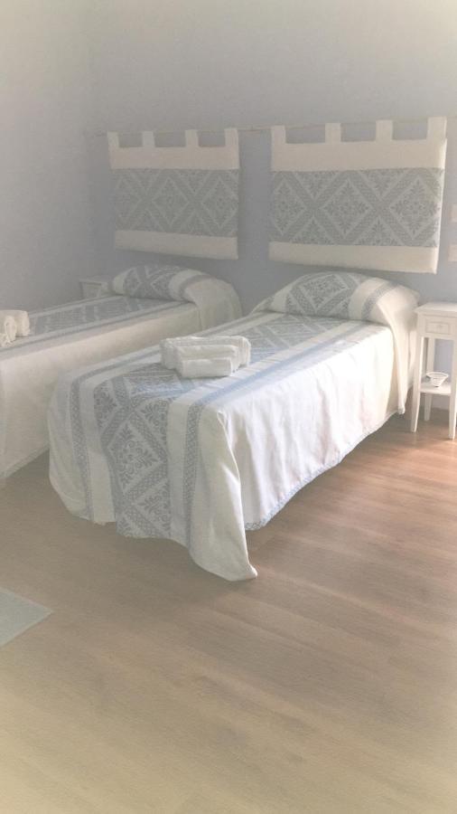 Guest House Le Gemelle Luras ภายนอก รูปภาพ